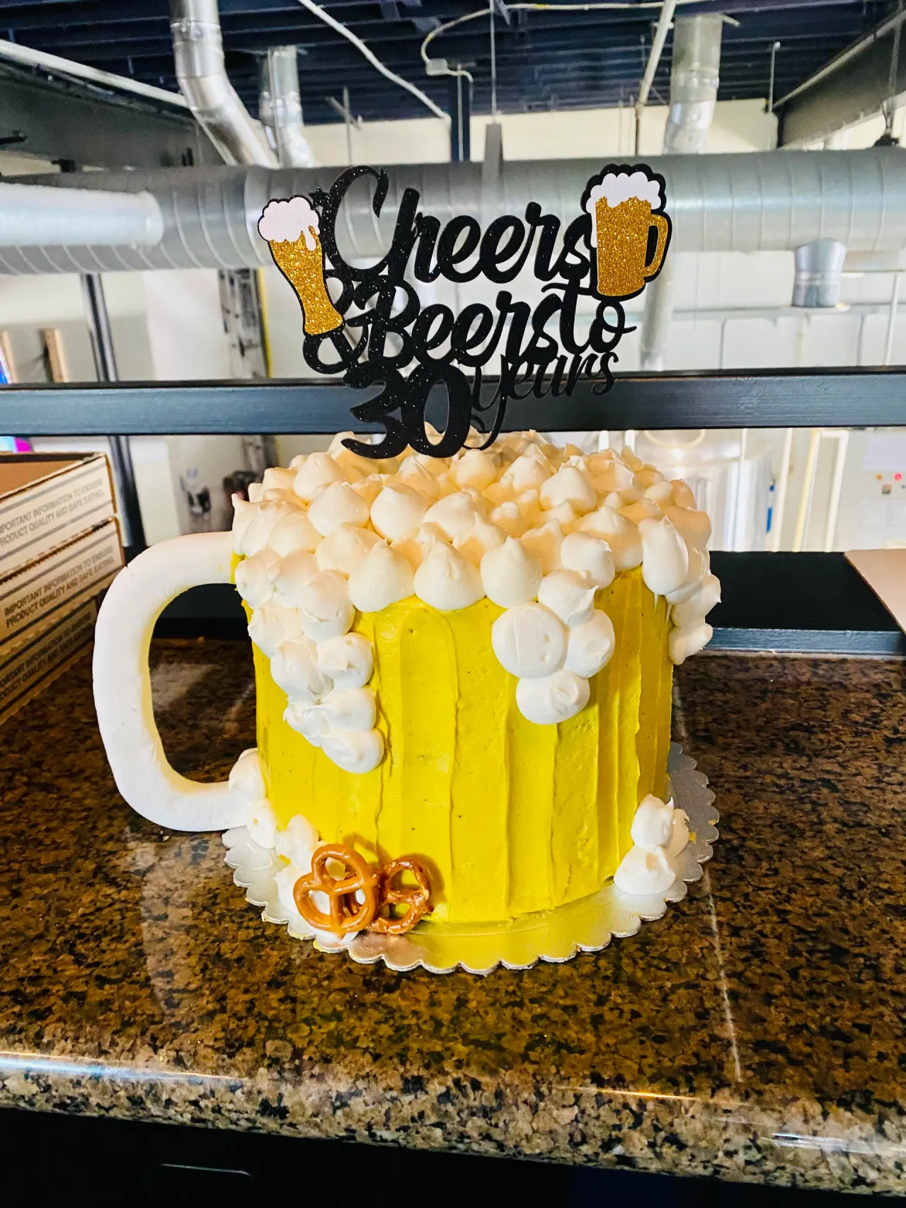 Beer mug shaped celebration cake